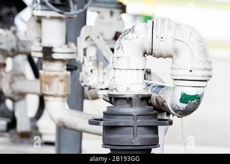 Close up view of connected fuelling pipe hoses on the fuel base Stock Photo