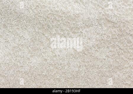 Relief textile background with clean white surface. Stock Photo