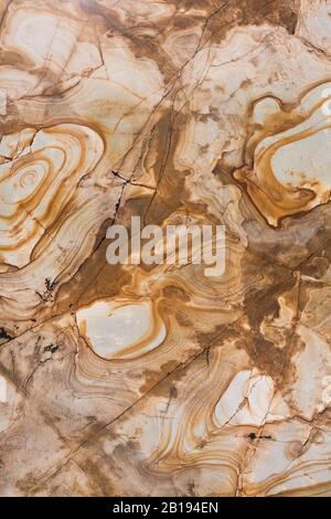 Brown granite tile texture. Natural stone abstract background. Stock Photo