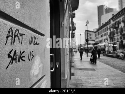 Art Will Save Us graffiti in the artistic neighborhood of Brera in Milan Italy Stock Photo