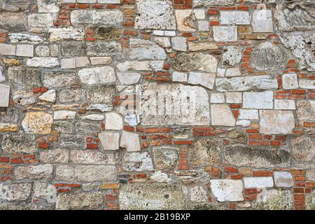 Old Shell rock brick wall as a background Stock Photo