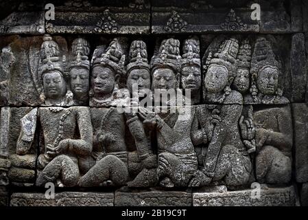 One of the thousands of relief panels in Borobudur Temple, Central Java, Indonesia. Stock Photo