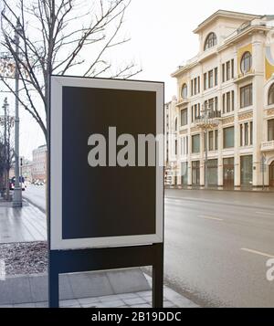 Blank black rectangular pylon stand on street mockup, side view Stock Photo