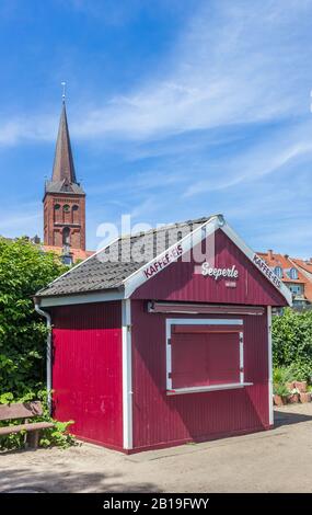 Litle red ice cream shop at the educational Planetenpfad in Plon, Germany Stock Photo