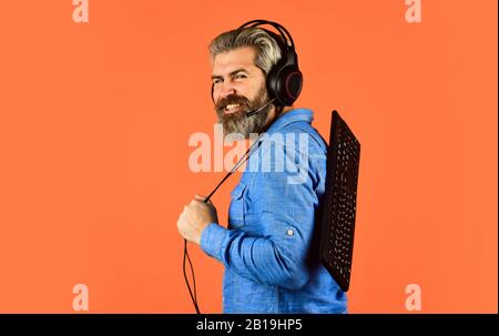 Superior performance. Graphics settings pushed to limit. Play computer games. Online gaming. Modern leisure. Run any modern game. Shop gadgets. Hipster gamer headphones and keyboard. Gaming addiction. Stock Photo