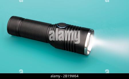 Battery powered flashlight with copy space for your text Stock Photo