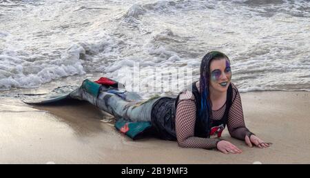 Woman cosplay costume dressed as a mermaid posing on the sand at Bathers Beach Fremantle Western Australia. Stock Photo