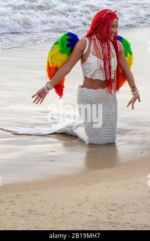 Woman cosplay costume dressed as a mermaid posing on the sand at Bathers Beach Fremantle Western Australia. Stock Photo