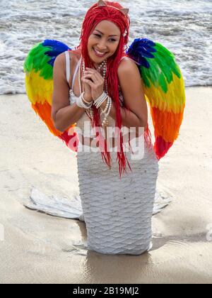 Woman cosplay costume dressed as a mermaid posing on the sand at Bathers Beach Fremantle Western Australia. Stock Photo