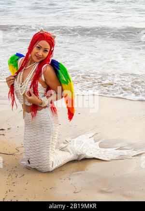 Woman cosplay costume dressed as a mermaid posing on the sand at Bathers Beach Fremantle Western Australia. Stock Photo