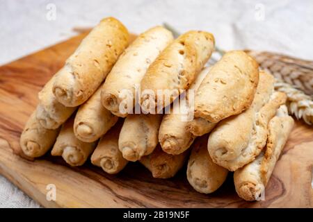 Small italian bread rolls crostini made from wheat dough with sesame close up Stock Photo