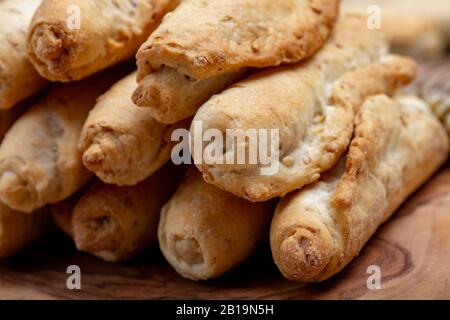 Small italian bread rolls crostini made from wheat dough with sesame close up Stock Photo