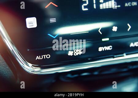 Automatic air conditioning touch panel and close-up to AUTO button Stock Photo