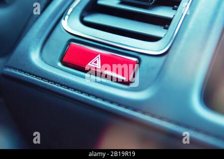 Close-up to emergency light button in car Stock Photo