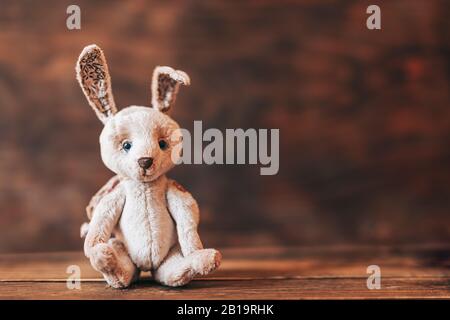 Colorful easter eggs and easter hand made rabbit. Stock Photo