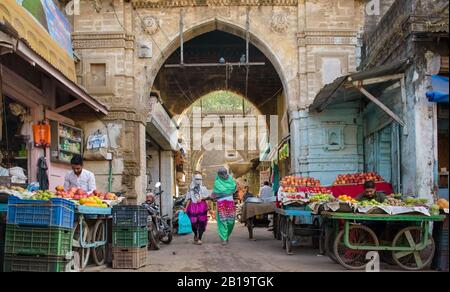 Junagadh, Gujarat, India - December 2018: The grand old arches of a gateway on a street in the old market around Circle Chowk. Stock Photo