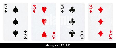 Four Playing Cards Isolated on White Background, Showing Three from Each Suit - Hearts, Clubs, Spades and Diamonds. Stock Photo