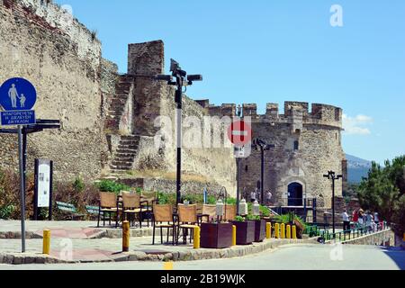 Thessaloniki, Greece - June 09, 2017: Unidentified people and Trigoniou Tower of medieval castle on hill of the city in Central Macedonia Stock Photo