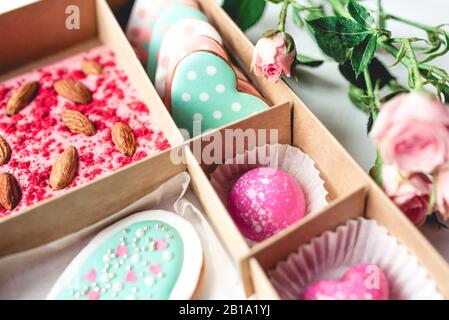 Gift set with hand made sweets in a box on a white table. Stock Photo