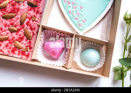 Gift set with hand made sweets in a box on a white table. Stock Photo