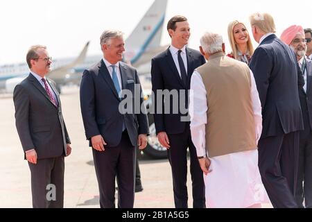 Ahmedabad, India. 24th Feb, 2020. U.S. President Donald Trump introduces Indian Prime Minister Narendra Modi, to members of his delegation on arrival at Sardar Vallabhbhai Patel International Airport February 24, 2020 in Ahmedabad, Gujarat, India. Standing from left to right are: National Security Advisor Robert O'Brien, son-in-law Jared Kushner and first daughter Ivanka Trump. Credit: Shealah Craighead/White House Photo/Alamy Live News Stock Photo