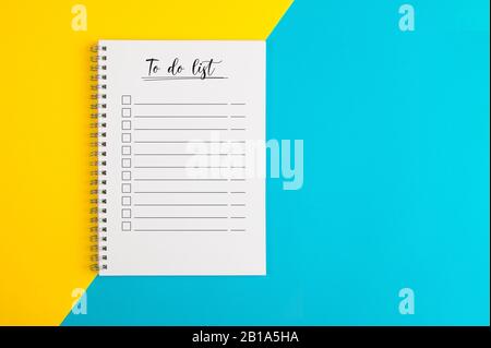To do list on a yellow and blue background Stock Photo