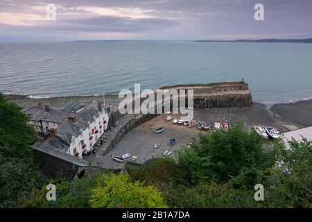 The harbour village of Clovelly on the North Devon coast and Bideford Bay beyond, England. Stock Photo
