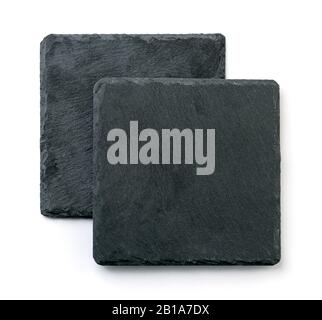 Top view of two black square empty slate stone plate isolated on white Stock Photo