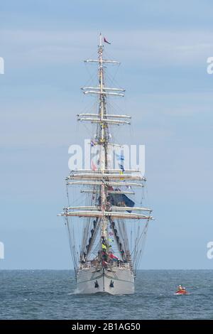 The Shabab Oman II, a three-masted full-rigged ship, at the North Sea near Scheveningen, the Netherlands during the Liberty Tall Ships regatta. Stock Photo
