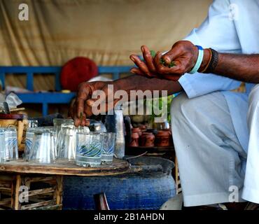 old man preparing a authentic tea in Cairo, Egypt Stock Photo