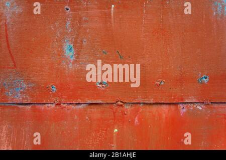 Old iron background painted in brown and blue with rust and chipped. Stock Photo