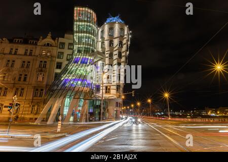 Dancing buildings at night in Prague city Stock Photo