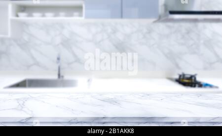White marble texture  table top on blurred kitchen background Stock Photo