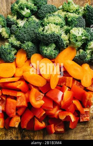 Mixed vegetables sliced on a cutting board still life Stock Photo