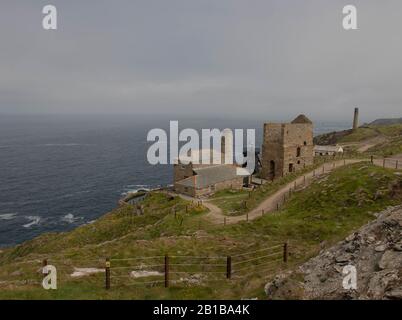 Ruins of the Abandoned Cornish Levant Tin Mine on the South West Coast Path Between Pendeen Watch and Sennen Cove in Rural Cornwall, England, UK Stock Photo