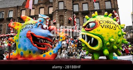 Dusseldorf, Germany. 24th Feb, 2020. Rosenmontag carnival parade in Dusseldorf, Germany. Float designed by German artist Jacques Tilly. Corona Virus. Credit: Vibrant Pictures/Alamy Live News Stock Photo