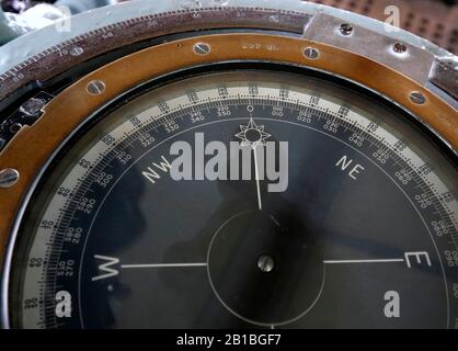AJAXNETPHOTO. 3RD APRIL, 2019. CHATHAM, ENGLAND. - COURSE TO STEER - SHIP'S COMPASS ON THE BRIDGE OF HMS CAVALIER, WORLD WAR II C CLASS DESTROYER PRESERVED AFLOAT IN NR 2 DOCK AT THE CHATHAM HISTORIC DOCKYARD. PHOTO:JONATHAN EASTLAND/AJAX REF:GX8 190304 20109 Stock Photo