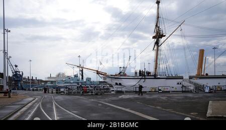 AJAXNETPHOTO. 3RD APRIL, 2019. CHATHAM, ENGLAND. - HISTORIC DOCKYARD -  HMS GANNET, A COMPOSITE HULLED TEAK AND IRON FRAMED STEAM AND SAIL POWERED VICTORIAN SLOOP BUILT AT SHEERNESS IN 1878. AFTER 90 YEARS SERVICE AS A GLOBAL PATROL SHIP AND AS  THE TRAINING SHIP T.S. MERCURY BASED ON THE HAMBLE RIVER NEAR SOUTHAMPTON, SHE WAS RESTORED AND NOW RESIDES IN NR 4 DRY-DOCK AT THE CHATHAM HISTORIC DOCKYARD. BEHIND GANNET IS THE WORLD WAR II DESTROYER HMS CAVALIER.  PHOTO:JONATHAN EASTLAND/AJAXREF:GX8 190304 20162 Stock Photo
