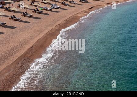Island of Sveti Stefan, close-up of the island in the afternoon. Montenegro, the Adriatic Sea, the Balkans Stock Photo