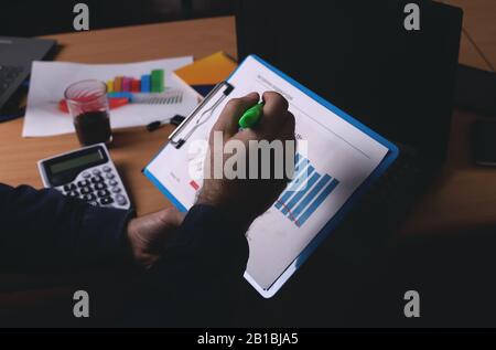 Businessman working with documents in office Stock Photo