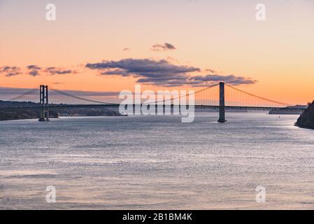 The Tacoma Narrows bridge is actually two suspension bridges over Puget Sound, serving as a link between Tacoma & the Kitsap Peninsula. Stock Photo