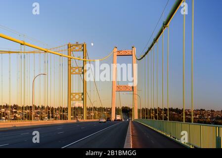 The Tacoma Narrows bridge is actually two suspension bridges over Puget Sound, serving as a link between Tacoma & the Kitsap Peninsula. Stock Photo