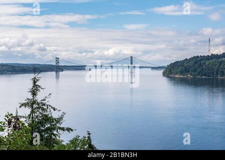 The Tacoma Narrows bridge is actually two suspension bridges over Puget Sound, serving as a link between Tacoma & the Kitsap Peninsula. Stock Photo