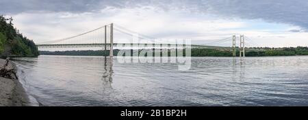 The Tacoma Narrows bridge is actually two suspension bridges over Puget Sound, serving as a link between Tacoma & the Kitsap Peninsula. Stock Photo