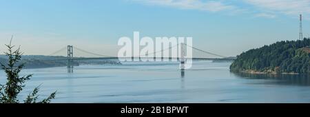 The Tacoma Narrows bridge is actually two suspension bridges over Puget Sound, serving as a link between Tacoma & the Kitsap Peninsula. Stock Photo