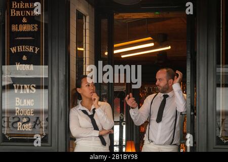 waiters waiting for customers in restaurant Paris France Stock Photo