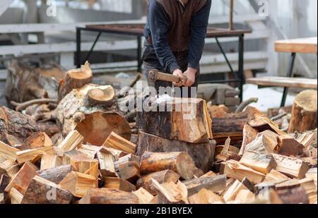 Woodcutters who break wood with an axe in Turkey Stock Photo