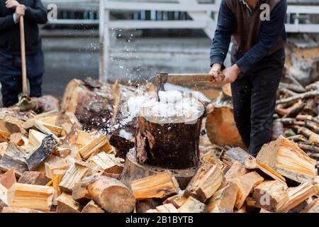 Woodcutters who break wood with an axe in Turkey Stock Photo