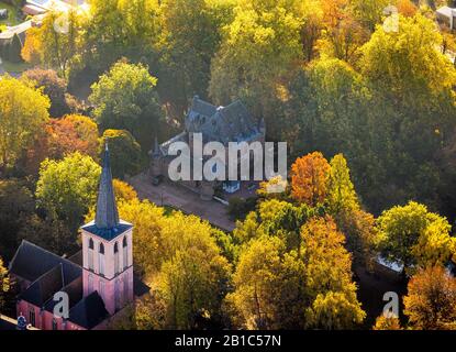 Aerial photograph, Restaurant Castle Ingenhoven in the autumnal forest, Old Church Lobberich, Lobberich district, Ingenhovenpark, Nettetal, Lower Rhin Stock Photo