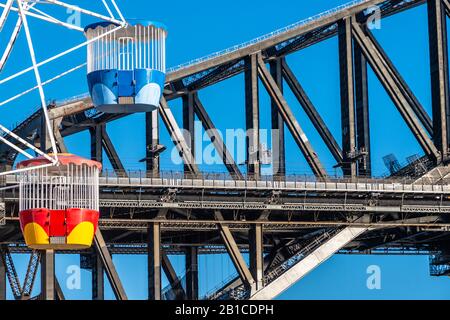 Close up of Sydney ferry wheel and Harbour Bridge on a blue sky Stock Photo